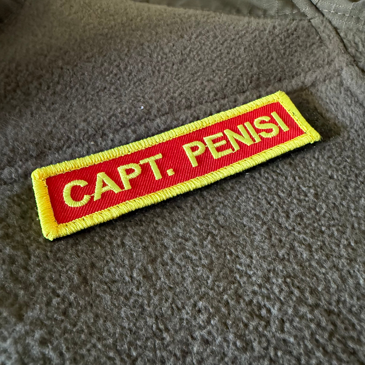 Patch „Captain Penisi“ (Namensband)