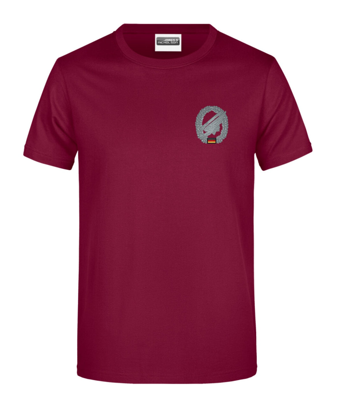 Camiseta con insignia de paracaidista y letras de veterano en el pecho. 